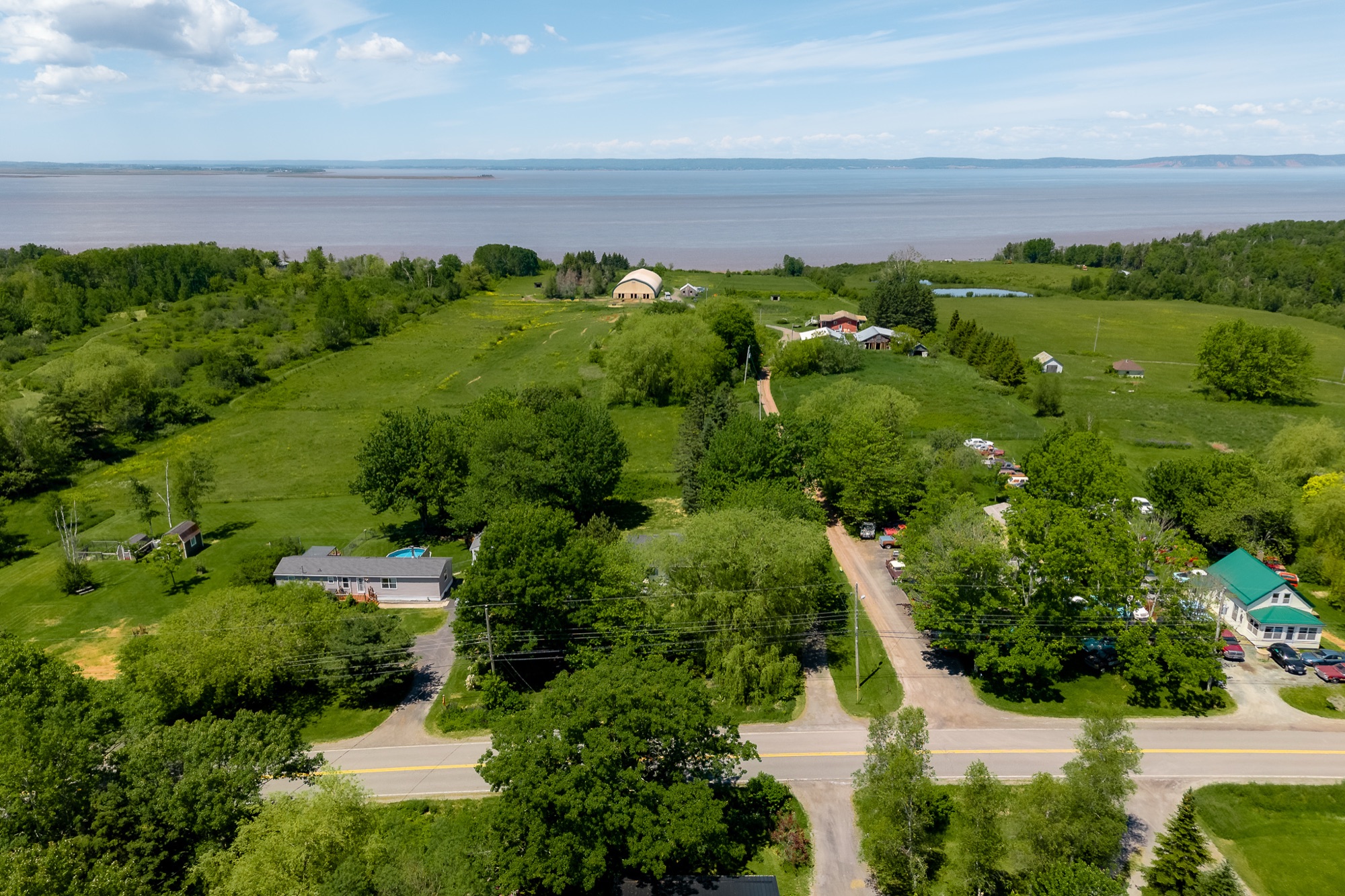 Aerial of the property fronting Highway 215 with the Minas Basin beyond