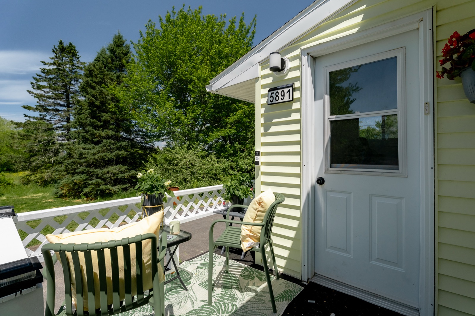 Back deck seating beside the side door