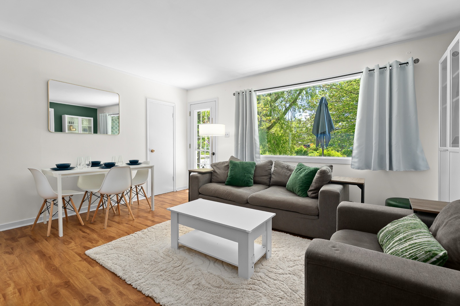 Living room with two sofas and a large picture window