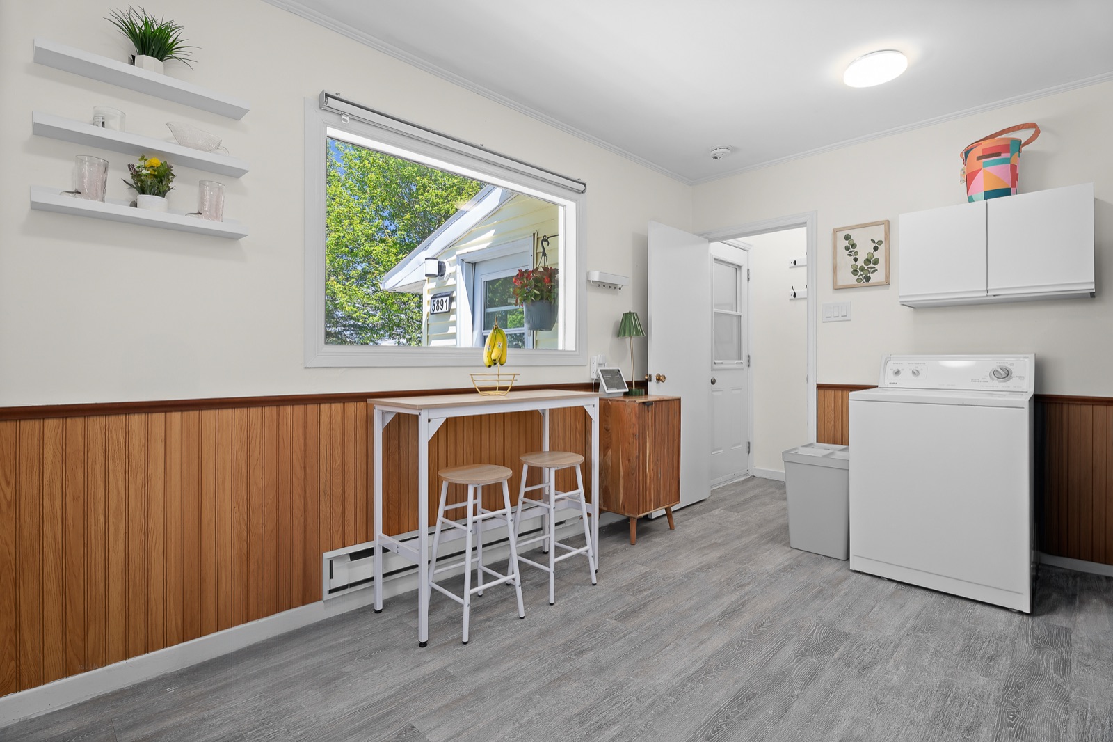 Eat-in nook and back entry with newer flooring
