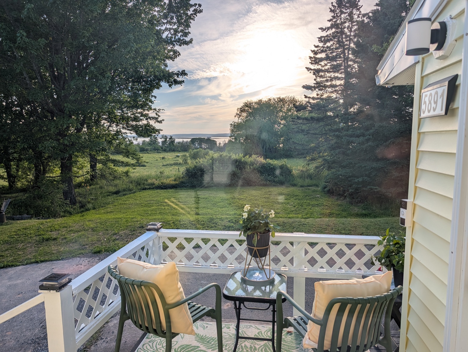 Warm evening light over the fields from the deck at 5891